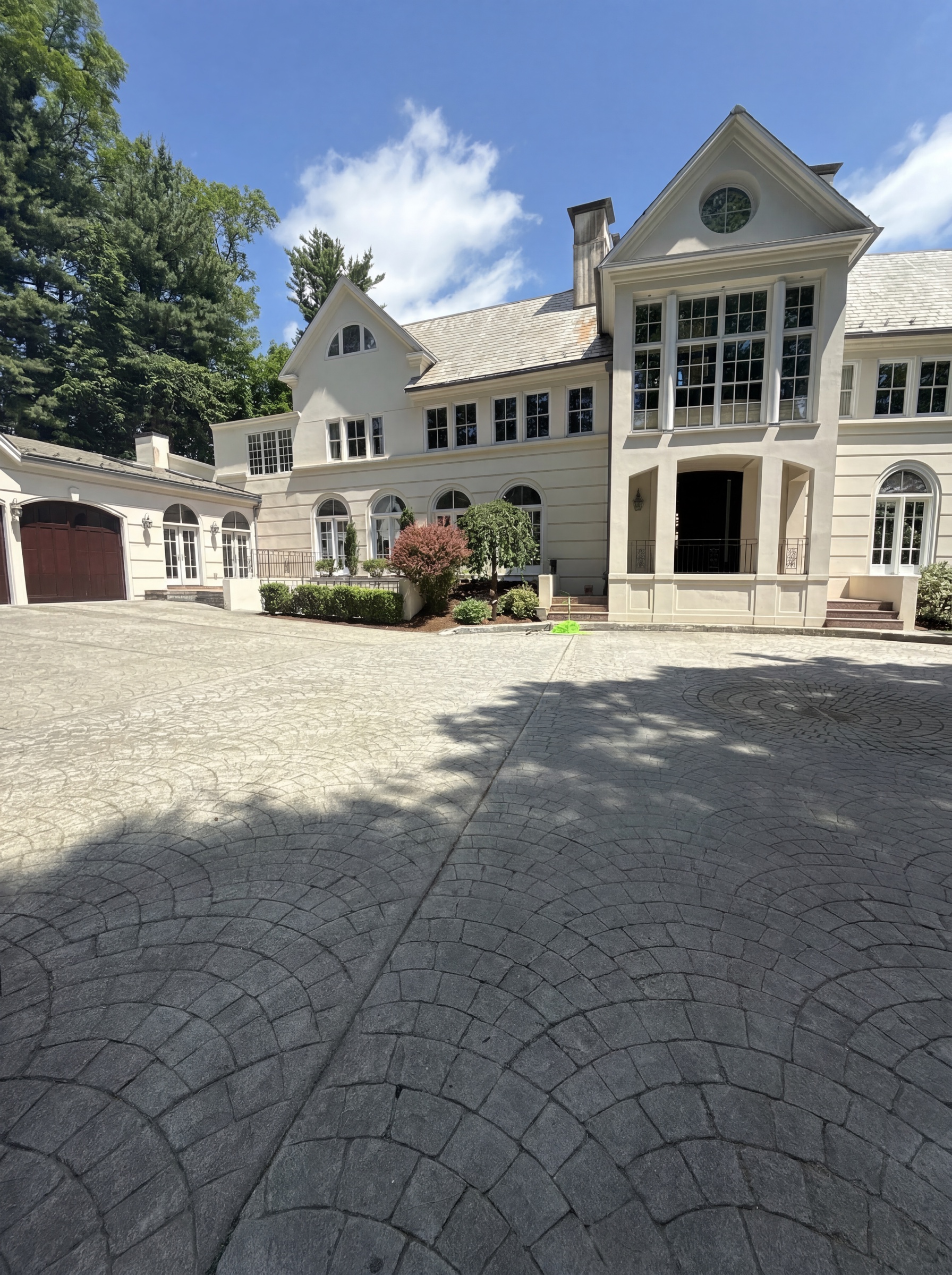 Stucco facade after Clearstead pressure washing — restored uniform finish