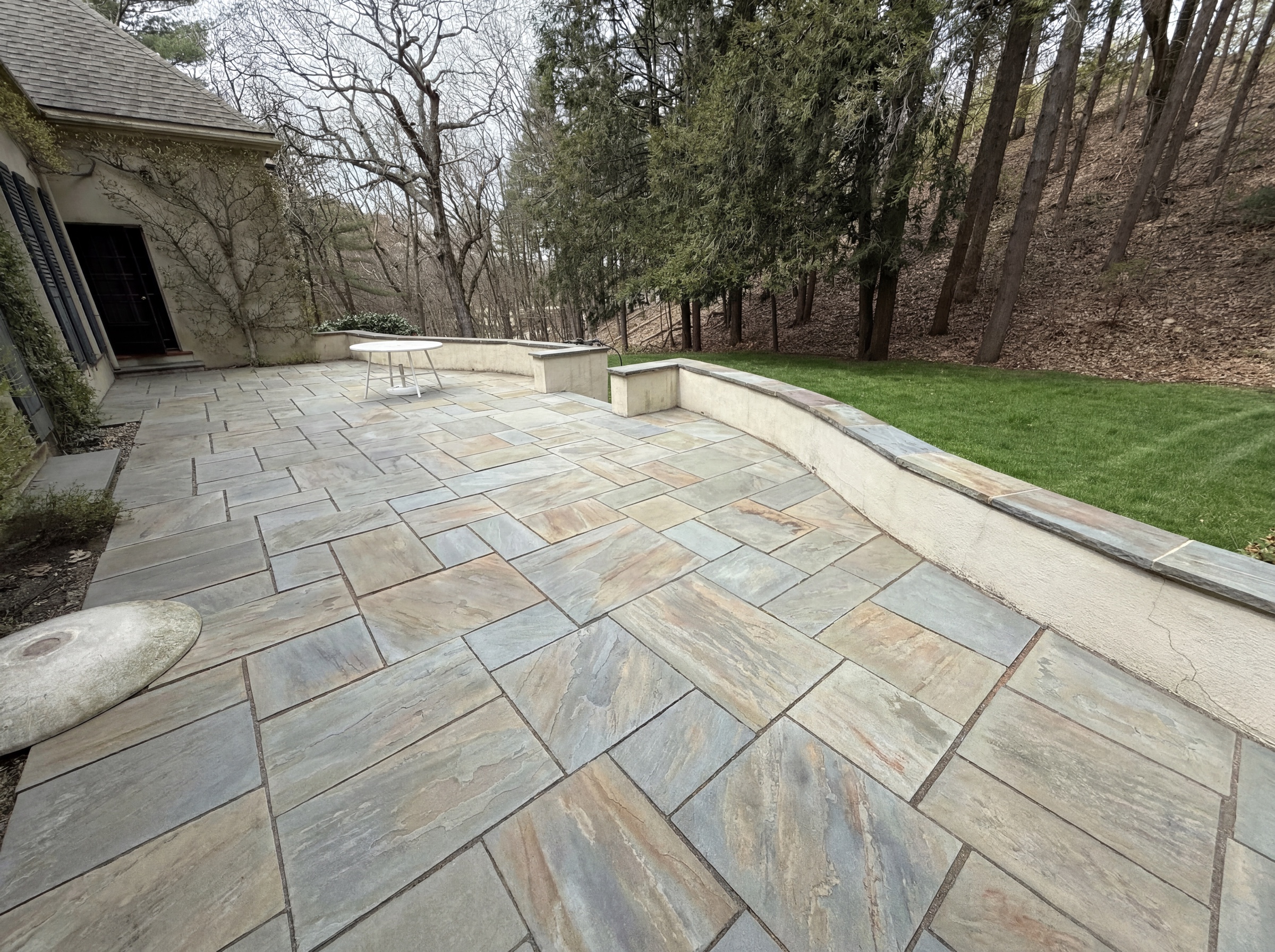 Bluestone patio after Clearstead surface cleaning — restored natural tone